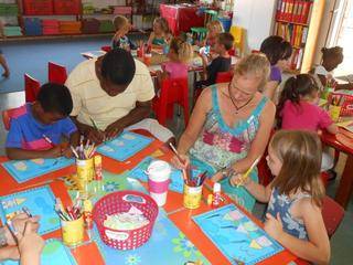 Milani, Dad Bandile, Mom Ida and Emma are hard at work!