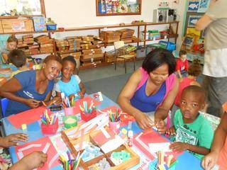 Mom Bambie, Iminathi, Mom Mendiwe and Enzo enjoys making pictures together.