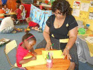 Liyema are enjoying drawing with Granny Margaret.