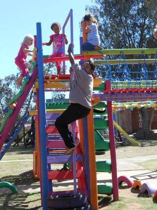 DOWN the fireman's pole! Good for you mommy!