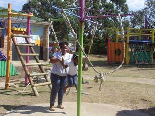 Lulibo enjoys swinging with mom Sindiswa.